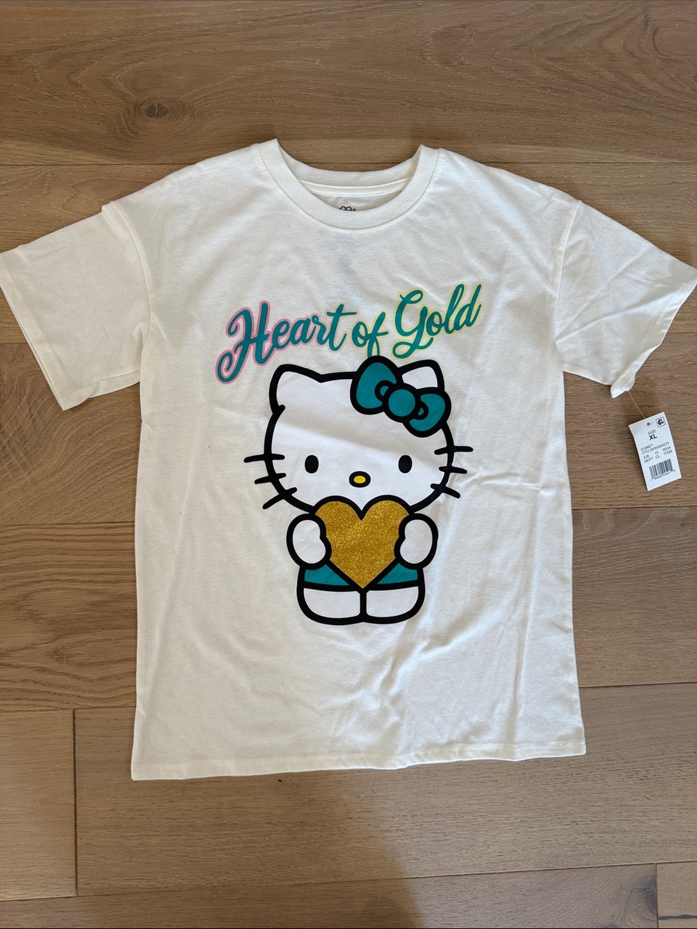 NWT Hello Kitty White Short Sleeve Kids Tee with Gold Heart and Teal Bow size XL